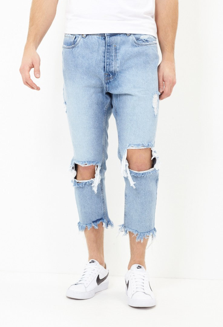 Cut Out Knee Light Blue Cropped Jeans