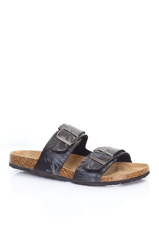 Slip On Sandals In Black Floral Faux Leather With Buck